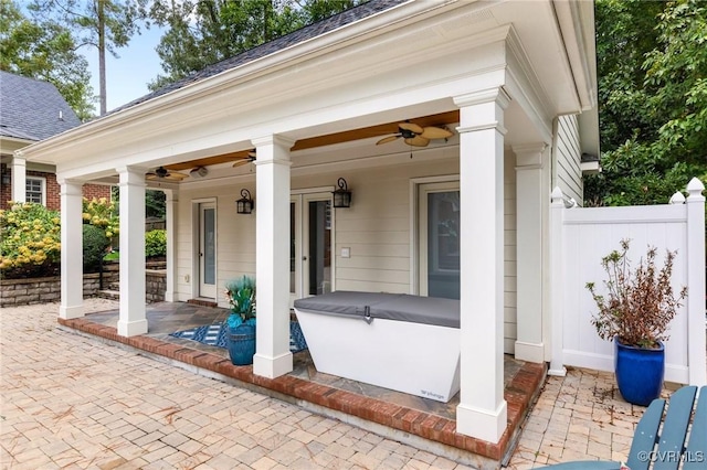 view of patio / terrace featuring fence and ceiling fan