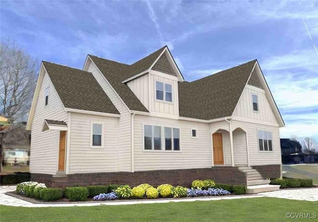 view of front facade featuring board and batten siding and roof with shingles