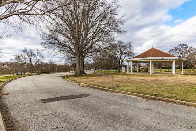 view of street featuring curbs