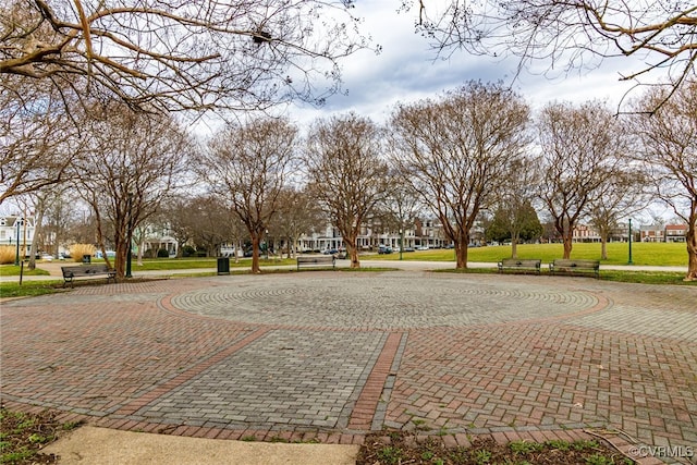 surrounding community featuring a yard