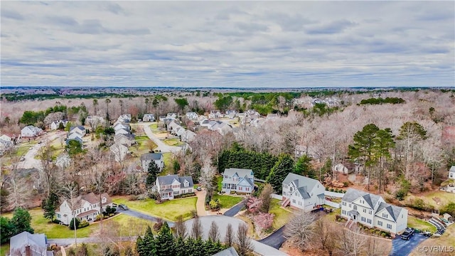 birds eye view of property with a residential view