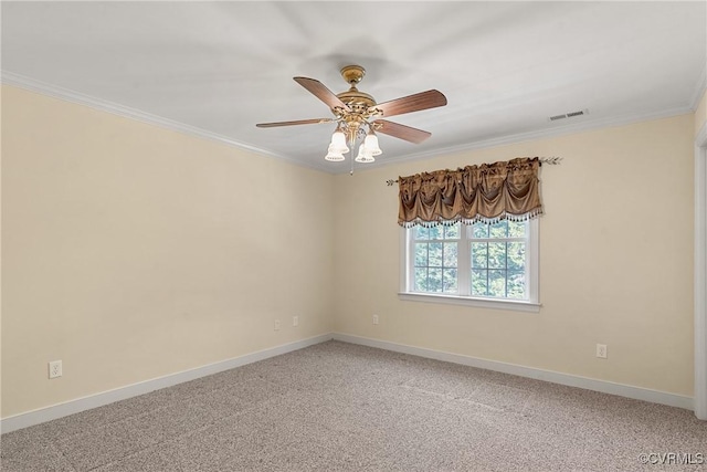 empty room with visible vents, baseboards, light colored carpet, and crown molding