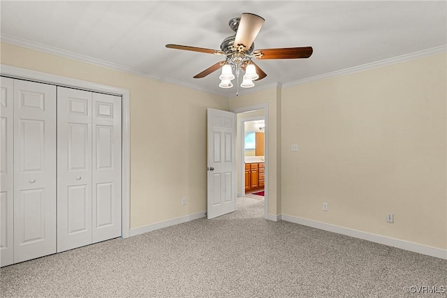 unfurnished bedroom with carpet, baseboards, and ornamental molding