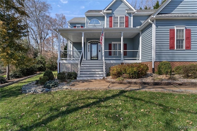 view of front of house with a front lawn and covered porch