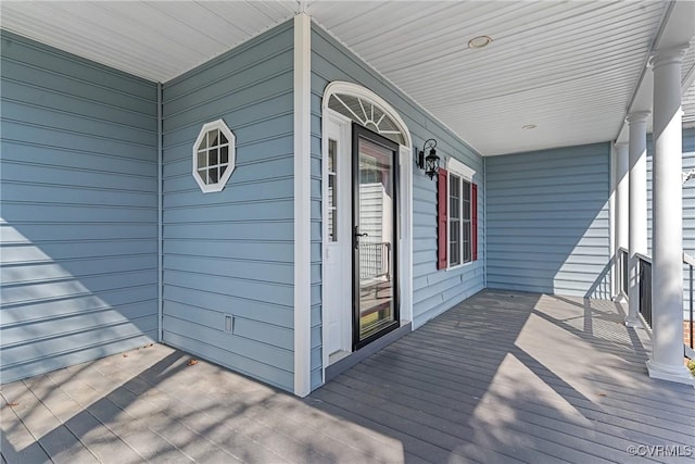 wooden terrace with covered porch