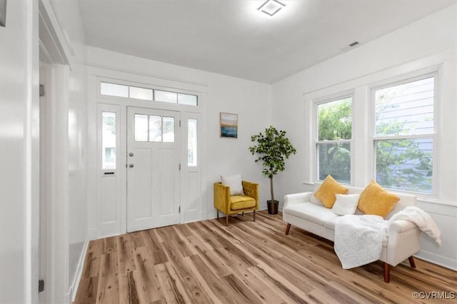 foyer featuring light wood-style floors