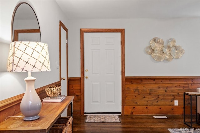 1909 Dinwiddie Ave, Hopewell, VA 23860 - foyer with dark wood-type flooring, wainscoting, and wooden walls