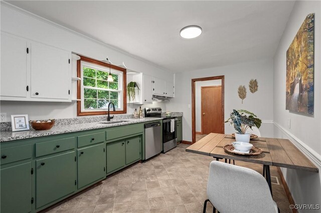 1909 Dinwiddie Ave, Hopewell, VA 23860 - kitchen featuring stainless steel appliances, white cabinets, under cabinet range hood, and open shelves