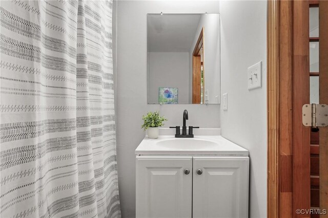 1909 Dinwiddie Ave, Hopewell, VA 23860 - bathroom featuring vanity and a shower with curtain