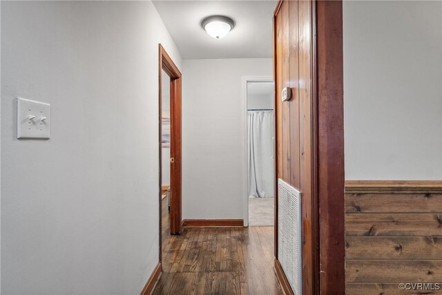 1909 Dinwiddie Ave, Hopewell, VA 23860 - corridor with dark wood-style floors and baseboards