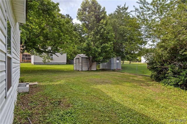 1909 Dinwiddie Ave, Hopewell, VA 23860 - view of yard featuring a storage unit