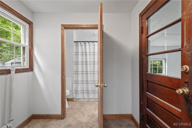 1909 Dinwiddie Ave, Hopewell, VA 23860 - full bath featuring plenty of natural light and a shower with curtain
