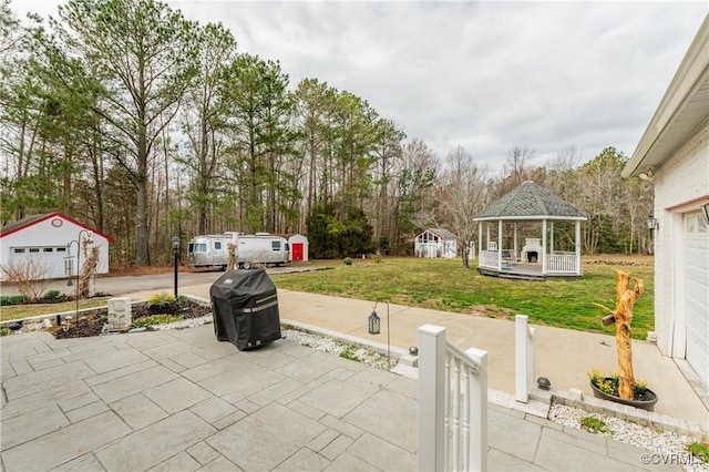 view of patio featuring a gazebo and fence