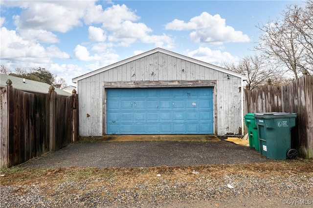 detached garage with fence