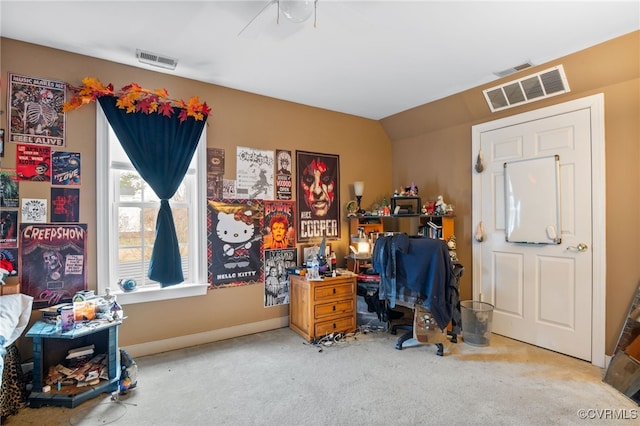 carpeted home office with visible vents and baseboards