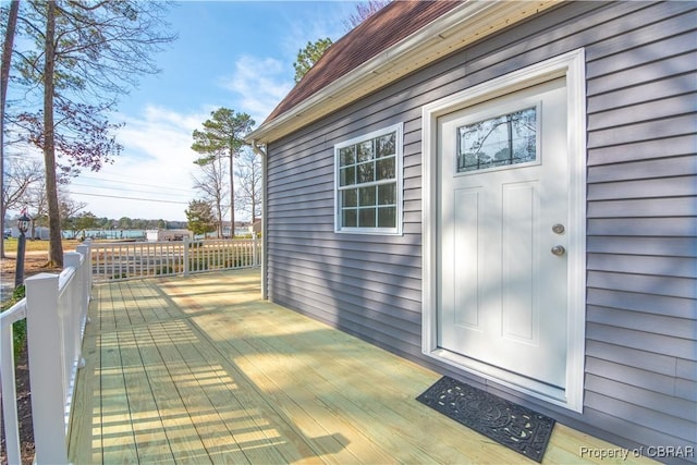 entrance to property featuring a deck