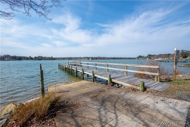 dock area featuring a water view