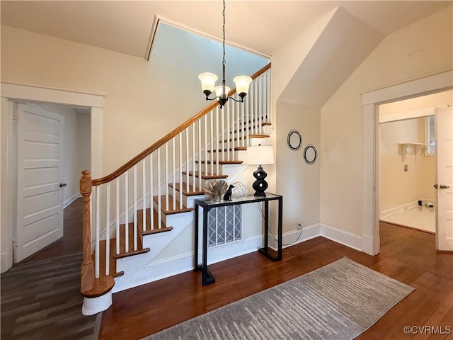 1934 Wood St, Richmond, VA 23223 - stairway featuring a notable chandelier, wood finished floors, and baseboards