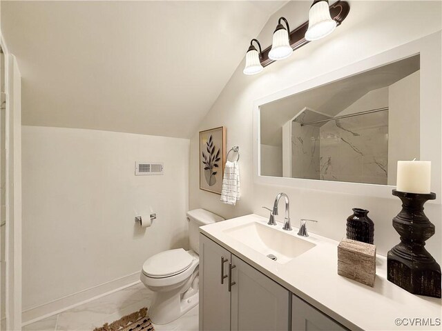1934 Wood St, Richmond, VA 23223 - bathroom featuring vanity, visible vents, vaulted ceiling, toilet, and marble finish floor