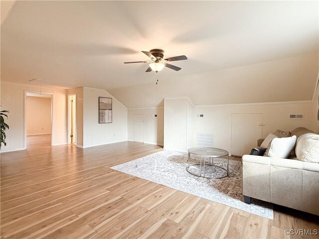 1934 Wood St, Richmond, VA 23223 - living room featuring visible vents, light wood-style floors, ceiling fan, and vaulted ceiling