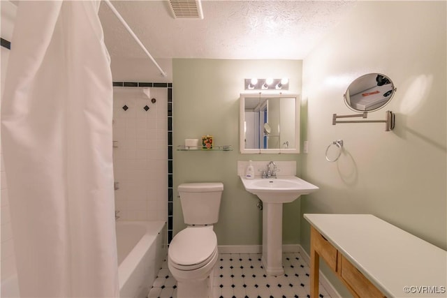 full bath with baseboards, visible vents, shower / bath combination with curtain, a textured ceiling, and toilet