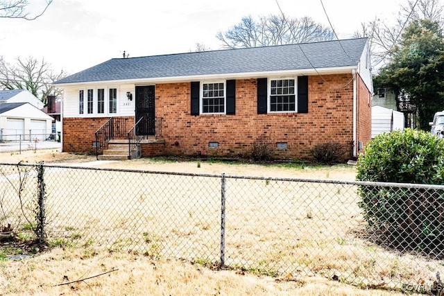 view of front of house with crawl space, brick siding, and fence