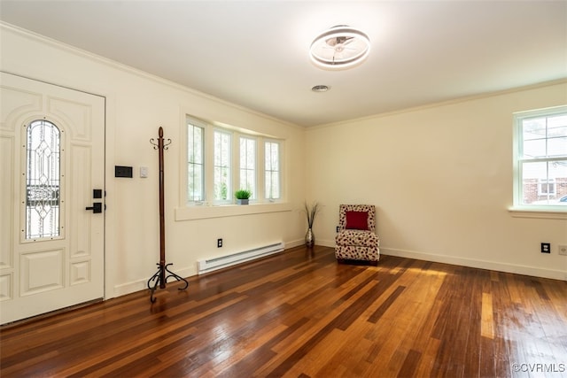 entrance foyer featuring a baseboard radiator, baseboards, dark wood-style flooring, and crown molding