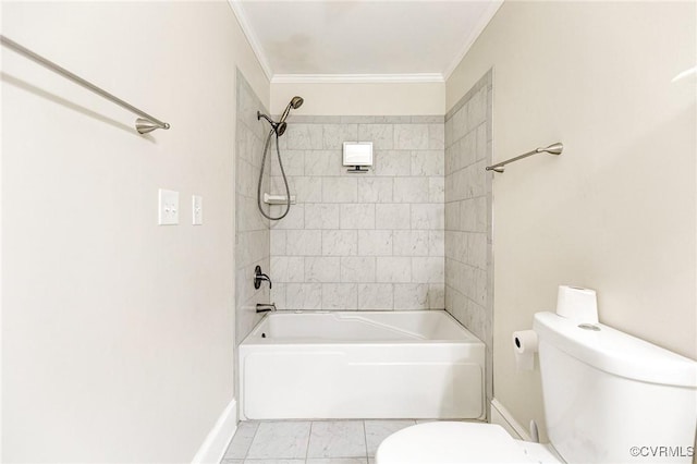 bathroom with toilet, washtub / shower combination, baseboards, and crown molding