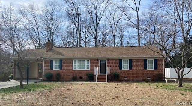 ranch-style house with crawl space, a chimney, fence, and brick siding