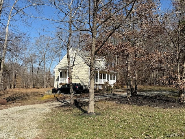 view of property exterior with driveway