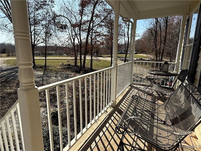 balcony featuring a porch