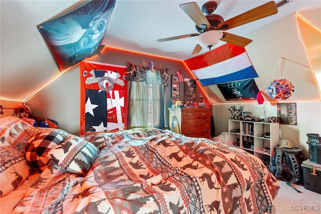 carpeted bedroom with vaulted ceiling, visible vents, and ceiling fan