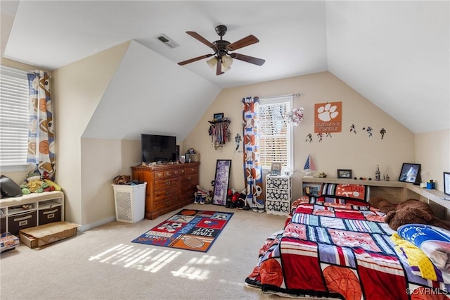 carpeted bedroom featuring visible vents, ceiling fan, and lofted ceiling