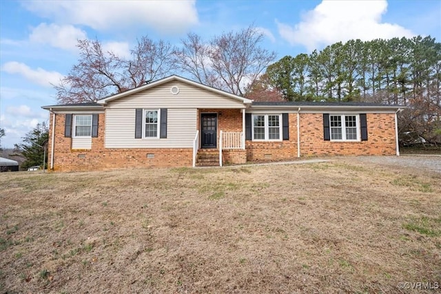 single story home featuring brick siding, crawl space, and a front yard