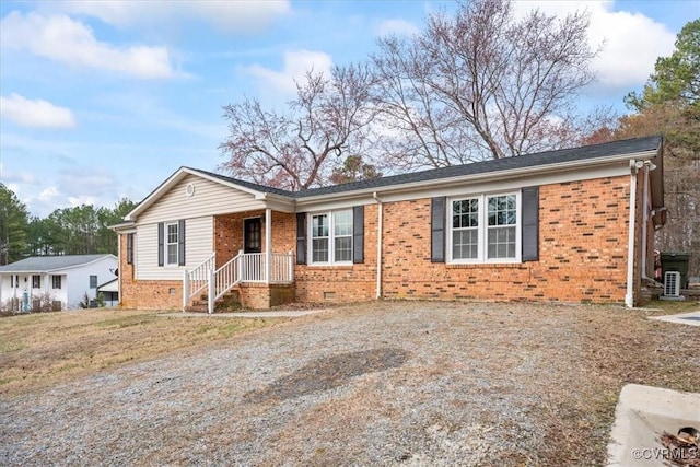 single story home with crawl space and brick siding