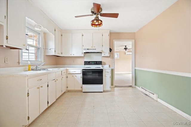 kitchen featuring under cabinet range hood, baseboard heating, electric stove, and light countertops