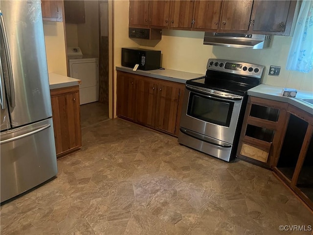 kitchen with light countertops, extractor fan, appliances with stainless steel finishes, and brown cabinets