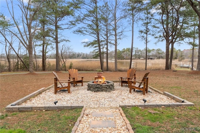 view of yard featuring a fire pit