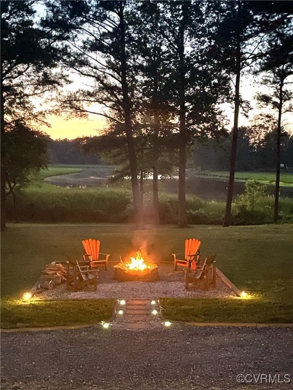 view of home's community featuring a fire pit