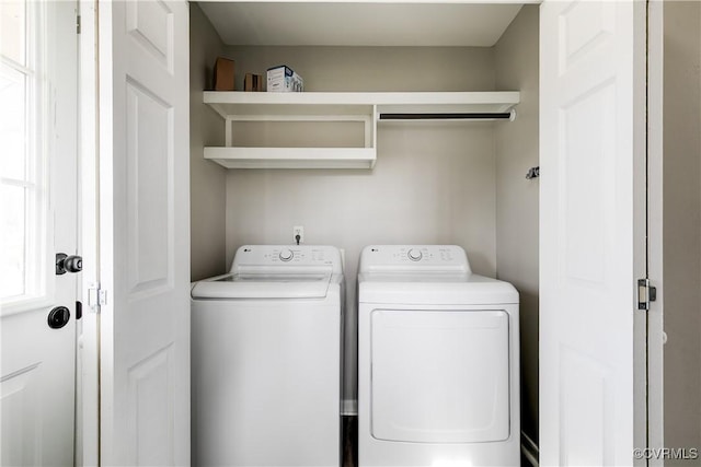 laundry area with laundry area and washing machine and dryer