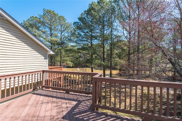 wooden deck featuring fence