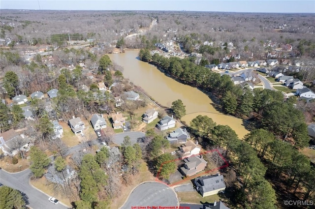 birds eye view of property featuring a residential view and a water view