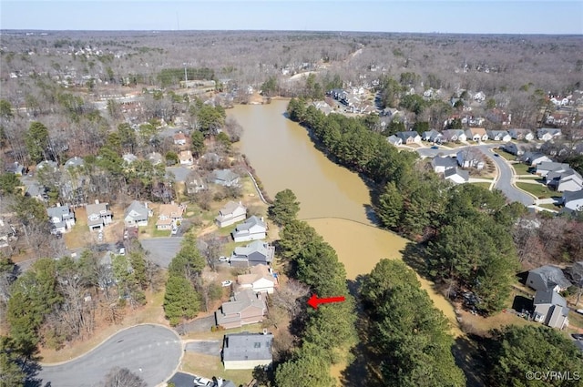 bird's eye view featuring a residential view and a water view