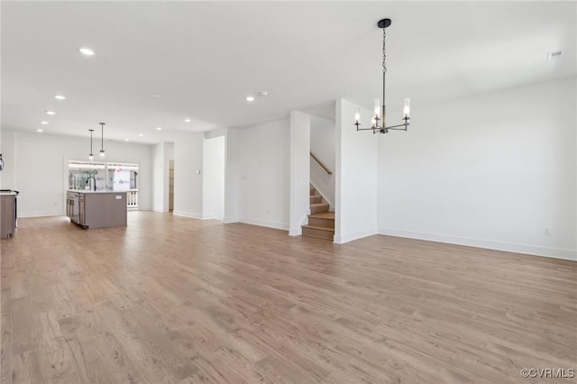 12149 Morning Walk, Henrico, VA 23233 - unfurnished living room featuring recessed lighting, light wood finished floors, baseboards, stairway, and a chandelier