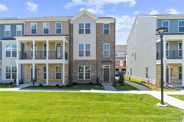 12149 Morning Walk, Henrico, VA 23233 - townhome / multi-family property featuring brick siding and a front yard