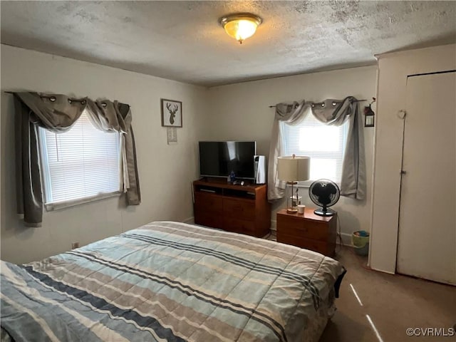 bedroom with a textured ceiling