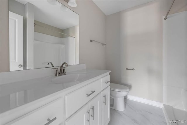 bathroom with marble finish floor, a shower, vanity, and toilet