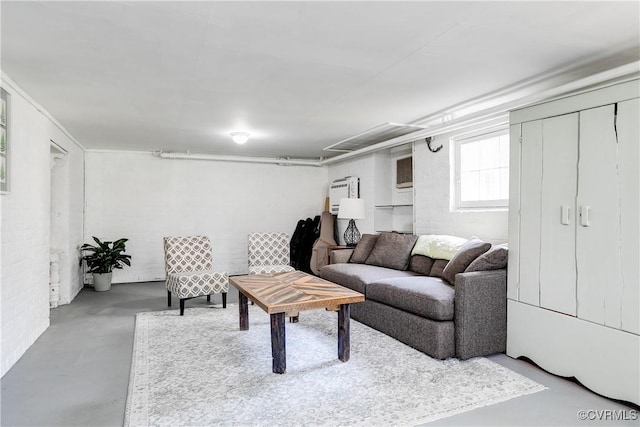 living room with concrete flooring