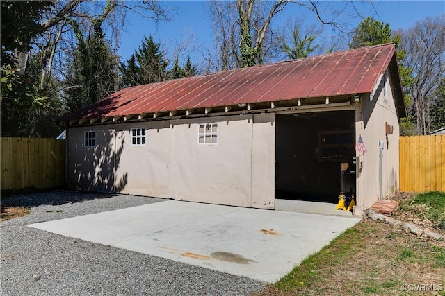 garage featuring fence