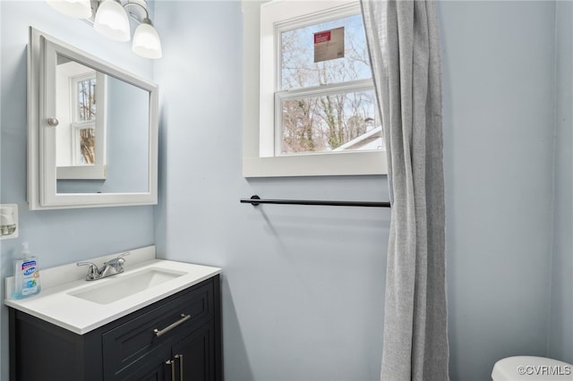 half bath with toilet and vanity